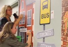 Art School of Peterborough exeutive director Jenni Johnston and volunteer Lori work on a mural in the C3 inpatient unit of Peterborough Regional Health Centre (PRHC). Last fall, a team of 16 volunteers with the art school painted for three days per week over two months to create the murals. (Screenshot from PRHC video)