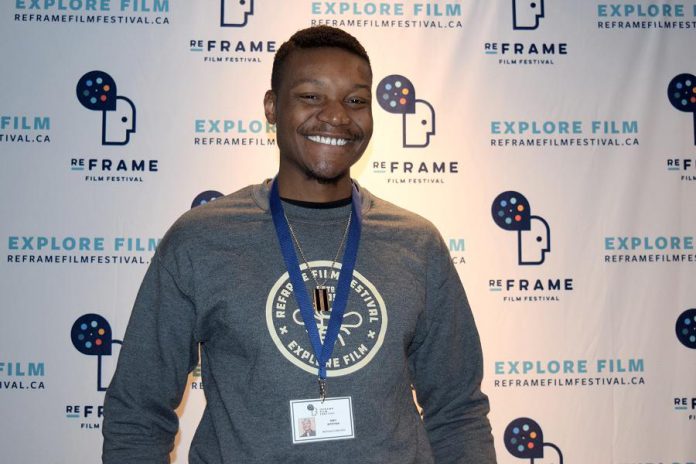 The annual ReFrame Film Festival wouldn't happen without the passion and dedication of volunteers like Mbongeni "Mbo" Mtetwa. Not only is Mbo the vice-chair of ReFrame's Board, but he has also volunteered on the Collective for four years and worked as a festival coordinator for a year. He has been a projectionist for the festival at Market Hall for his entire five years with the festival. This year's festival runs from January 24 to 27, 2019 in downtown Peterborough. (Photo courtesy of ReFrame)