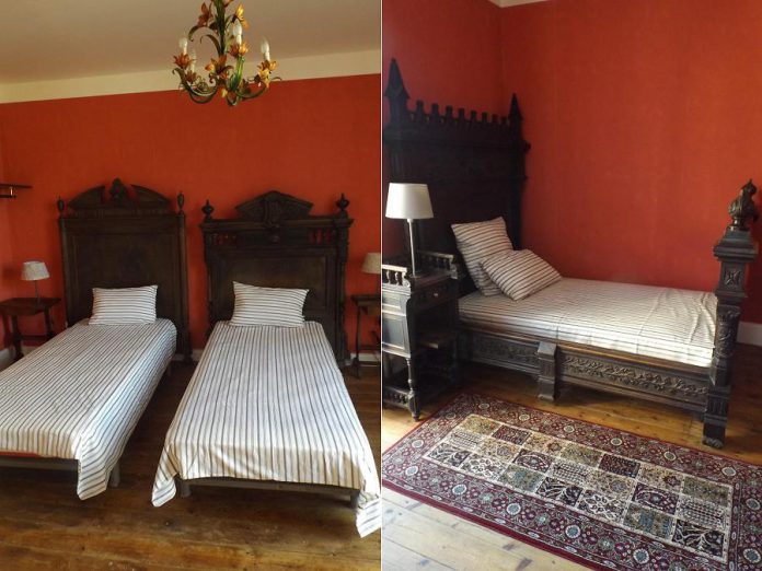 Two of the bedrooms at La Résidence Terrasson, furnished with period pieces handcrafted by a local family of cabinet makers who built pieces for estate homes and chateaus in the region.  The villa can accommodate 10 guests in four bedrooms. (Supplied photos