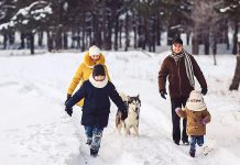 A family going for a winter walk outdoors