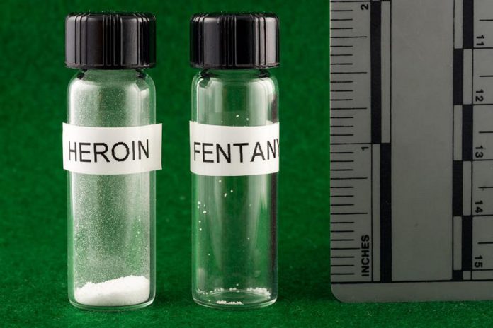On the left is a lethal dose of heroin, equivalent to about 30 milligrams; on the right is a 3-milligram dose of fentanyl, enough to kill an average-sized adult male. (Photo: New Hampshire State Police Forensic Lab)