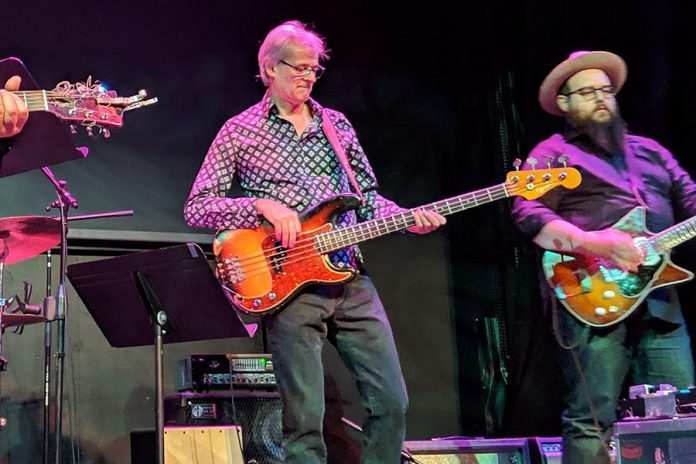 Russell deCarle will be joined by bassist John Dymond, pictured here performing with Lee Harvey Osmond at the Market Hall on February 8, 2019. (Photo: Bruce Head / kawarthaNOW.com)