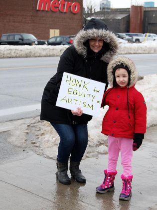 The protest against changes to Ontario Autism Program held outside Northumberland—Peterborough South MPP David Piccini's constituency office in Port Hope was one of several across Ontario on  February 15, 2019. (Photo: April Potter / kawarthaNOW.com)