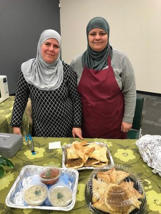 Wesal Hamatti and Nawaem Moussa  of the Newcomer Kitchen at the Peterborough Regional Farmers' Market in Peterborough Square.  (Supplied photo)