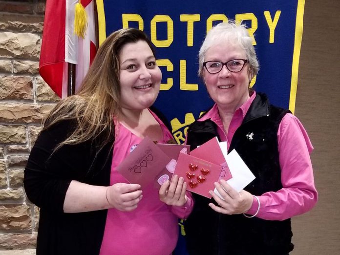 Barb Overwijk from Rubidge Retirement Residence and Kawartha Rotary member Janet McLeod with a few of the 80 customized Valentine's Day cards Rotary members made for residents of Rubidge Retirement Residence in Peterborough. (Photo courtesy of Rotary Club of Peterborough Kawartha)
