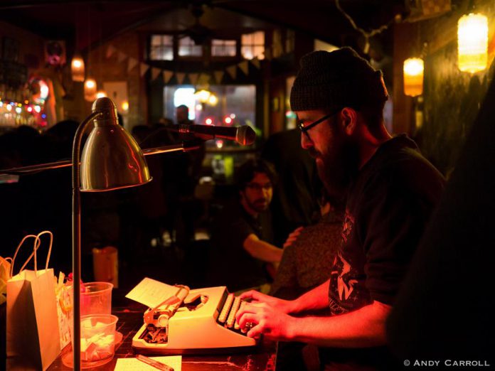 Peterborough poet Justin Million, host of KEYBOARDS!, at The Garnet, 2018. (Photo: Andy Carroll)