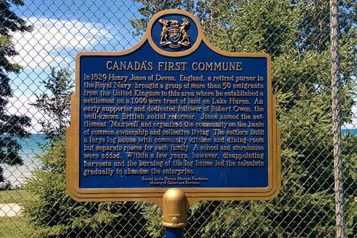 Cohousing is the modern equivalent of communal living, where large groups of people live together to share property and resources, which has been around since at least the 12th century.  Canada's first commune was built in 1829 near the shore of Lake Huron in Bright's Grove, Ontario, where 50 English settlers built a large log house with a shared kitchen and dining room, but separate rooms for each family. This historical plaque recognizing the commune is located on the grounds of the Bright's Grove Public School, which was built in 1873. (Photo: Bruce Head / kawarthaNOW.com)