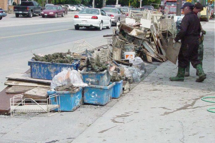 On July 15, 2004, a small but spectacular storm dumped more than 150 mm of rain in parts of the City of Peterborough in less than an hour. The city's sewer system couldn't cope with the huge volume of water, leading to back-ups and basement flooding. Around 12,500 tons of materials were placed in the landfill in the two weeks following the flood. (Photo: City of Peterborough)