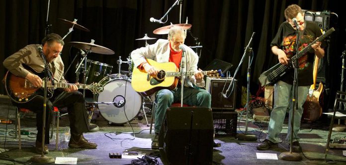  Joe Hall (centre) performing with Tony Quarrington and JP Hovercraft at JP's 60th birthday celebration at the Gordon Best in Peterborough in 2012. (Photo: SLAB Productions)