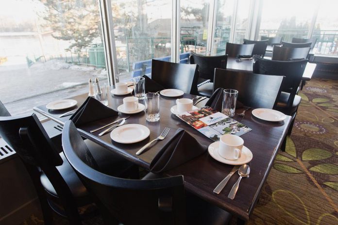 The dining room at Riverside Grill Restaurant at Holiday Inn Peterborough-Waterfront has been freshly renovated, with large, bright windows offering a view of the water. (Photo: Miranda Studios)