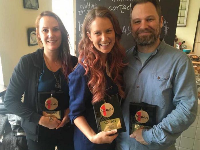  Megan Bonnell (middle) with her SOCAN No. 1 Song Award for "Separate Rooms". Also pictured is producer Chris Stringer (right) and Amy Eligh of Arts & Crafts Music Publishing. (Photo: Melissa Cameron-Passley / SOCAN)