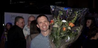 Jonathan MacKay of Sustain Eco Store accepts the grand prize, which includes a free year's lease of a storefront in downtown Peterborough, at the Win This Space 2019 entrepreneurial competition finale at Aria on March 5, 2019. Jonathan and his wife Celine (not pictured) already own and operate an eco-lifestyle retail store in Huntsville, which they will expand to a second location in downtown Peterborough this spring. (Supplied photo)