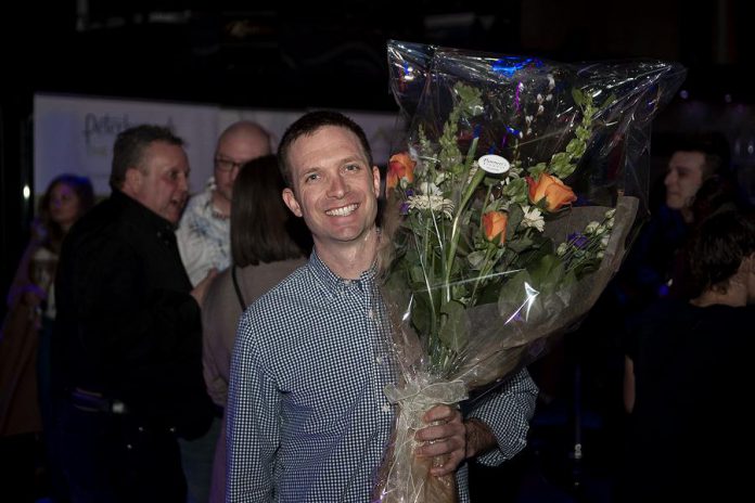 Jonathan MacKay of Sustain Eco Store accepts the grand prize, which includes a free year's lease of a storefront in downtown Peterborough, at the Win This Space 2019 entrepreneurial competition finale at Aria on March 5, 2019. Jonathan and his wife Celine (not pictured) already own and operate an eco-lifestyle retail store in Huntsville, which they will expand to a second location in downtown Peterborough this spring. (Supplied photo)