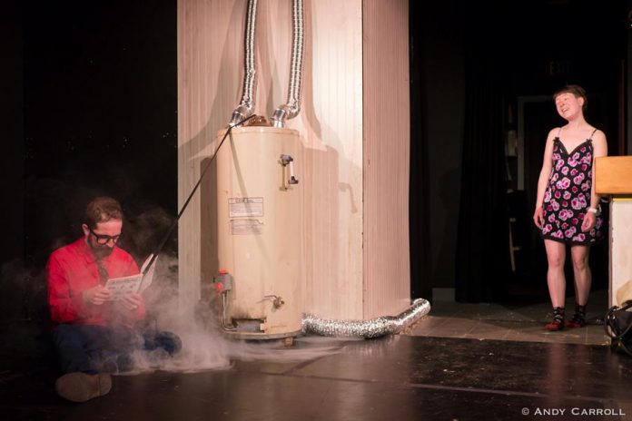 Earnest (Chris Jardin) troubleshoots the water heater while Ernestine (Robyn Smith) provides her own opinion. (Photo: Andy Carroll)