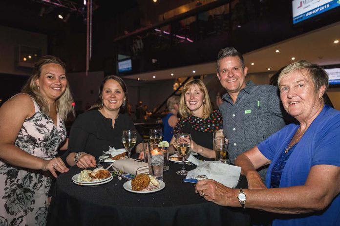 Attendees at the 2018 Business Hall of Fame event enjoying food and beverages supplied by Peterborough restaurants. Food vendors at this year's Culinary Showcase include Amuse Café, BE Catering, Central Smith Creamery, Curry Village, Electric City Bread Company, Fresh Dreams, Imperial Tandoor, La Mesita Restaurante, SKH Events and Catering Company, and more. Tickets are now available for the  2019 Business Hall of Fame, Induction Ceremony, and Culinary Showcase, which takes place on May 23rd at The Venue in downtown Peterborough.  (Photo: Heather Doughty)