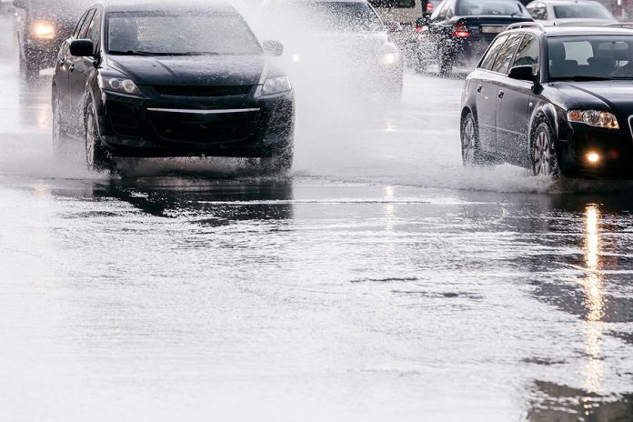 Cars on flooded road