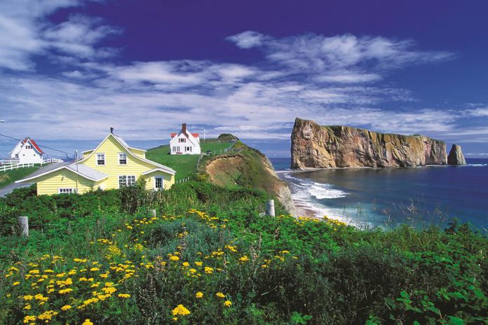 One major attraction of Gaspé Peninsula is the charming village of Percé. Be awed by the sight of Bonaventure Island and Percé Rock, just off the coast. Percé Rock is formed of reddish-gold limestone and shale and is considered one of the world's largest natural arches located in water and is a geologically and historically rich natural icon of Québec. (Supplied photo)