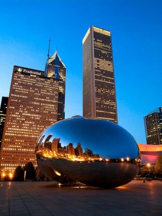 "Cloud Gate", a large public sculpture by Indian-born British artist Sir Anish Kapoor, is the centerpiece of AT&T Plaza at Millennium Park in the Loop community area of Chicago. Nicknamed The Bean because of its shape, the sculpture consists of 168 stainless steel plates welded together. With its highly polished exterior and no visible seams, the sculpture has been used as a backdrop in Hollywood films such as 2006's "The Break-Up" and 2011's "Source Code". (Supplied photo)