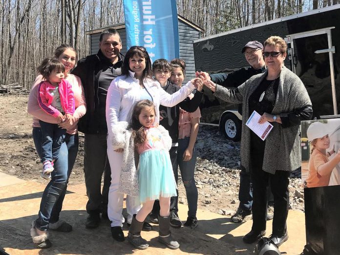 The Jacobs family receiving the keys to their new home from Curve Lake First Nation Chief Phyllis Williams and Habitat for Humanity Peterborough & Kawartha Region during a dedication ceremony at  Curve Lake First Nation on April 28, 2019. (Photo courtesy of Habitat for Humanity Peterborough & Kawartha Region)