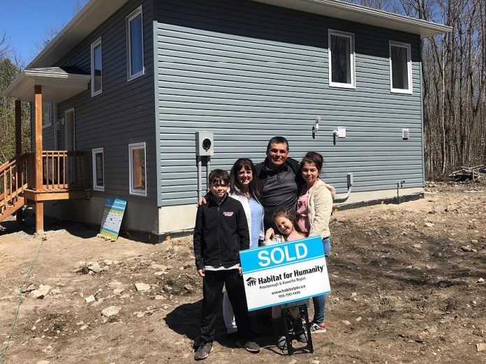 Members of the Jacobs family in front of their new home at 76 Quinquish Road in Curve Lake on April 28, 2019. The home was made possible through a partnership between Curve Lake First Nation and Habitat for Humanity Peterborough & Kawartha Region. (Photo courtesy of Habitat for Humanity Peterborough & Kawartha Region)