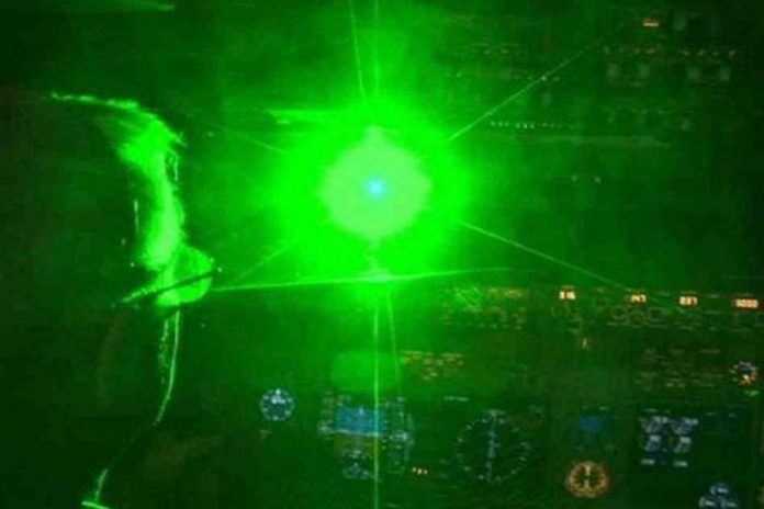 Laser light directed at aircraft can create a hazard by distracting or temporarily blinding a pilot during a critical phase of flight. It is a federal offence in Canada punishable by up to $100,000 in fines and/or up to five years in prison. (Photo: YouTube screenshot)