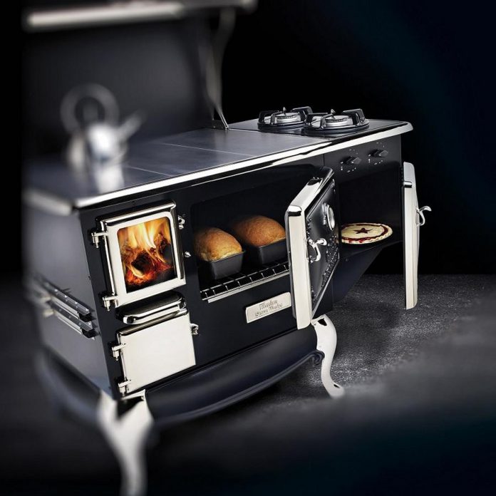 The Fireview wood-burning cookstove serves as a high-output room heater, a cooking appliance, an attractive fire-viewing woodstove and (with an optional water jacket) a source of hot water -- all using a renewable resource. For cooking versatility, you can add the optional side gas burners. (Photo courtesy of Elmira Stove Works)