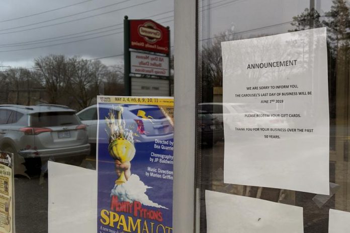 A notice in the front entrance window of the Carousel announcing the closure.  (Photo: Bruce Head / kawarthaNOW.com)