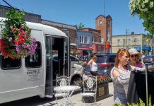 The White Lightning Shopping Bus in Fenelon Falls during a test run in July 2018. The free bus service will run every Tuesday making stops at locations in Kawartha Lakes including Lindsay, Fenelon Falls, Bobcaygeon, Omemee, and more. (Photo: White Lightning Bus Tours)