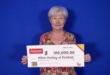 Wilma Marling of Kirkfield with her $100,000 prize. (Photo courtesy of OLG)