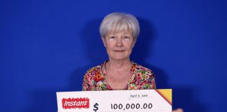 Wilma Marling of Kirkfield with her $100,000 prize. (Photo courtesy of OLG)