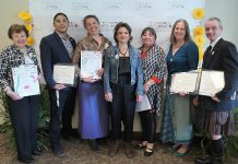 The recipients of the second annual Peterborough Arts Awards: Charlie Werger (Beth McMaster accepting on his behalf), Nimkii Osawamick, Beau Dixon and Patti Shaughnessy (Lisa Dixon accepting on Beau's behalf), Alice Williams, Hilary Wear, and Ryan Kerr. The awards were presented at The Mayor's Luncheon for the Arts in Peterborough on May 24, 2019. (Photo: Bianca Nucaro-Viteri / kawarthaNOW.com)