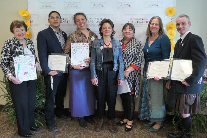 The recipients of the second annual Peterborough Arts Awards: Charlie Werger (Beth McMaster accepting on his behalf), Nimkii Osawamick, Beau Dixon and Patti Shaughnessy (Lisa Dixon accepting on Beau's behalf), Alice Williams, Hilary Wear, and Ryan Kerr. The awards were presented at The Mayor's Luncheon for the Arts in Peterborough on May 24, 2019. (Photo: Bianca Nucaro-Viteri / kawarthaNOW.com)