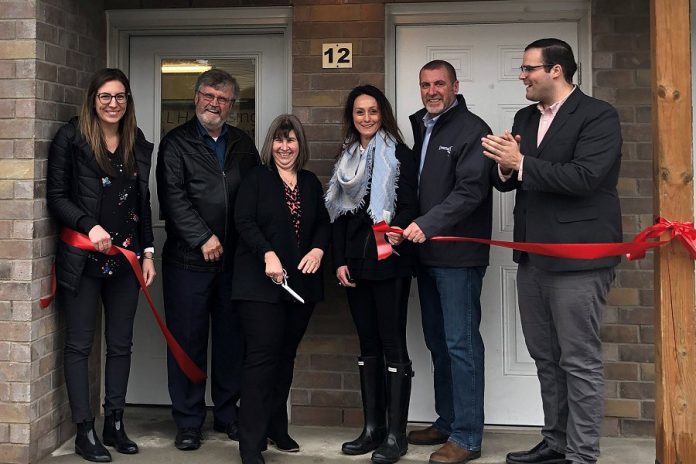 Officials at the grand opening of Bond by the River on May 1, 2019. The affordable housing project in Lindsay features 12 three-bedroom townhouse units at a cost of $997 a month, 20 per cent less than the average market price. From left to right: Erika Robson for MPP Laurie Scott, KLH Housing vice chair Pat Dunn, KLH Housing CEO Hope Lee, affordable housing consultant Nadia Venafro, City of Kawartha Lakes mayor Andy Letham, and Dylan Robichaud for MP Jamie Schmale. (Photo courtesy of City of Kawartha Lakes)