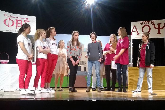 The two opposing sororities compete for pledges: Lena Ross, Sarah Theberge, Jordan De Groot, Hunter Sanderson , Hannah Boyes, Annika Goeckel, Victoria Bell, Taite Cullen, and Eden Ferris. (Photo: Sam Tweedle / kawarthaNOW.com)