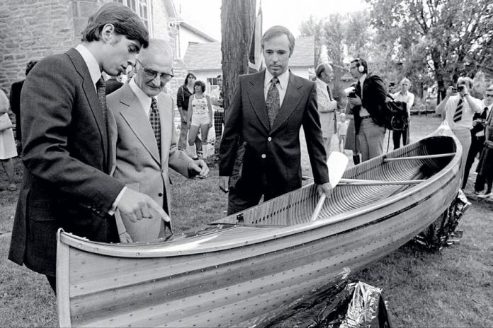 A 17-year-old Prince Andrew (left) receiving a gift from the Village of Lakefield of a cedar-strip canoe handmade by 70-year-old master builder Walter Walker (centre) on June 15, 1977. On the right is Terry Guest, headmaster of Lakefield College School which Prince Andrew attended from January to June in 1977. In 1983, Guest and the Prince took the canoe on a paddling trip on the Nahanni River in the Northwest Territories. Prince Andrew donated the canoe  to The Canadian Canoe Museum's collection in 2004. (Photo: Michael Peake)