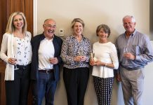 At the Lakefield College School trustees' meeting in Victoria, British Columbia on May 4, 2019, John and Jane Hepburn (second from left and second from right) share a toast with Lakefield College School board chair Nicole Bendal (left), Lakefield College School head of school and foundation Anne-Marie Kee, and Lakefield College School Foundation board chair Jock Fleming in celebration of the Hepburns' $15-millon donation to the school. (Photo courtesy of Lakefield College School)