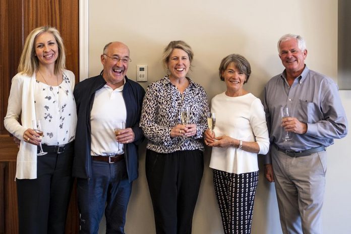 At the Lakefield College School trustees' meeting in Victoria, British Columbia on May 4, 2019, John and Jane Hepburn (second from left and second from right) share a toast with Lakefield College School board chair Nicole Bendal (left), Lakefield College School head of school and foundation Anne-Marie Kee, and Lakefield College School Foundation board chair Jock Fleming in celebration of the Hepburns' $15-millon donation to the school. (Photo courtesy of Lakefield College School)