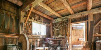 Lang Pioneer Village Museum, the award-winning living history museum in Keene, opens during the week for its 52nd season on May 21, 2019, and will open daily beginning on Sunday, June 16th with the 23rd annual Father's Day Smoke & Steam Show. Pictured is the museum's carpenter shop. (Photo courtesy of Lang Pioneer Village Museum)