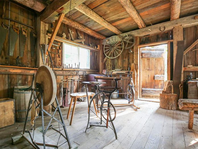 Lang Pioneer Village Museum, the award-winning living history museum in Keene, opens during the week for its 52nd season on May 21, 2019, and will open daily beginning on Sunday, June 16th with the 23rd annual Father's Day Smoke & Steam Show. Pictured is the museum's carpenter shop. (Photo courtesy of Lang Pioneer Village Museum)