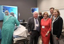 Martin, Denise, and Charles Pick with Dr. Rardi van Heest at the official dedication of the new Martin and Denise Pick Learning Centre at Peterborough Regional Health Centre on May 14, 2019. They toured the clinical training room, where a simulation of minimally invasive surgical training was demonstrated. (Photo: Natasha Roulston / Peterborough Regional Health Centre)