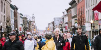 On May 1, 2019, around 300 people gathered at Confederation Square in downtown Peterborough as part of the "May 1st General Strike Against Ford" and marched along George Street and Hunter Street. (Photo: Thayla Fortin)