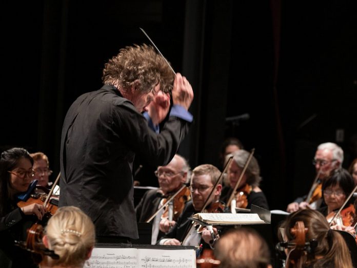 Maestro Michael Newnham conducting the Peterborough Symphony Orchestra during its "Romantik" concert on November 3, 2019. He says the PSO's performance of Berlioz's "Symphonie fantastique" is another milestone for the orchestra. (Photo:  Huw Morgan)