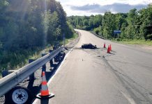 A motorcycle has been destroyed by fire and the driver is in hospital with life-threatening injuries following an accident on Highway 118 in Highlands East on June 16, 2019. A passenger also suffered injuries. (Photo: Bancroft OPP)