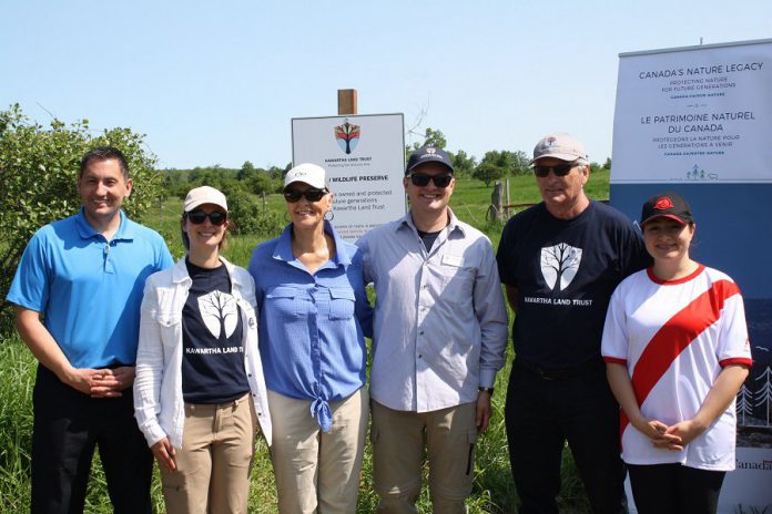 Kawartha Land Trust (KLT) has received $215,000 in funding from the Canadian government's Canada Nature Fund to support the continued protection of the Cation Wildlife Preserve near Coboconk. Peterborough-Kawartha MP Maryam Monsef announced the funding during the grand opening of the preserve on June 22, 2019. Pictured (left to right): Haliburton-Kawartha Lakes-Brock MP Jamie Schmale, KLT development manager Tara King, land donor Sharon Cation, KLT executive director John Kintare, land donor Dave Cation, and MP Monsef. (Photo: Office of Maryam Monsef)