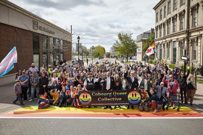 Representatives from Cobourg Queer Collective, the Cobourg chapter of PFLAG, the Cobourg Police Service, and the Town of Cobourg celebrate the new rainbow crosswalk  at King Street West and Second Streets in downtown Cobourg. June is Pride Month in Cobourg. (Photo: Town of Cobourg / Facebook)