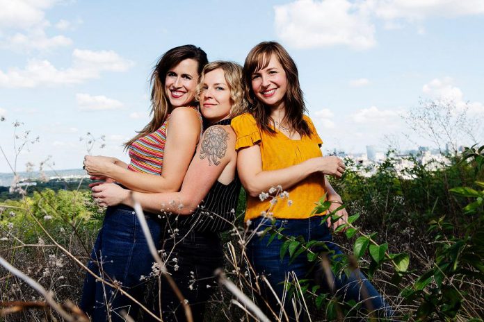 Good Lovelies are Caroline Brooks (lead vocals, electric and acoustic guitars), Kerri Ough (lead vocals, keyboards, banjo, guitar), and Susan Passmore (lead vocals, percussion, guitar). The trio will perform on Tuesday, October 1, 2019 at the Market Hall Performing Arts Centre in downtown Peterborough, joined by Christine Bougie on electric guitar and lap steel. (Publicity photo)