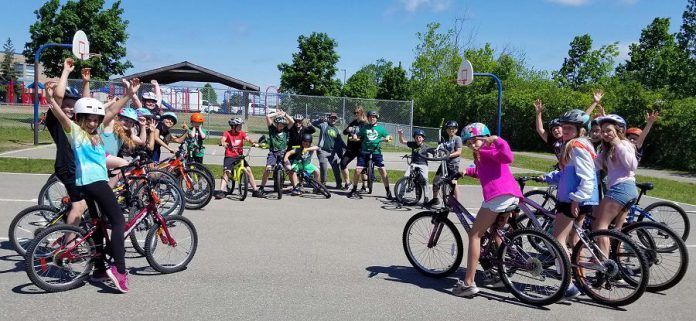 A group of students from St. Anne  Catholic Elementary School have been participating in Pedal Power this spring, along with 200 more Peterborough students who are enrolled in the cycling skills program this year. (Photo: Jaime Akiyama)