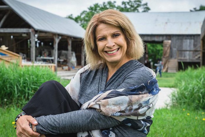 In 2019, Kim Blackwell is marking 25 years at 4th Line Theatre in Millbrook. The theatre's managing artistic director since 2014, Blackwell is pictured here at Winslow Farm in a photo for Heather Doughty's Inspire: The Women's Portrait Project. (Photo: Heather Doughty)