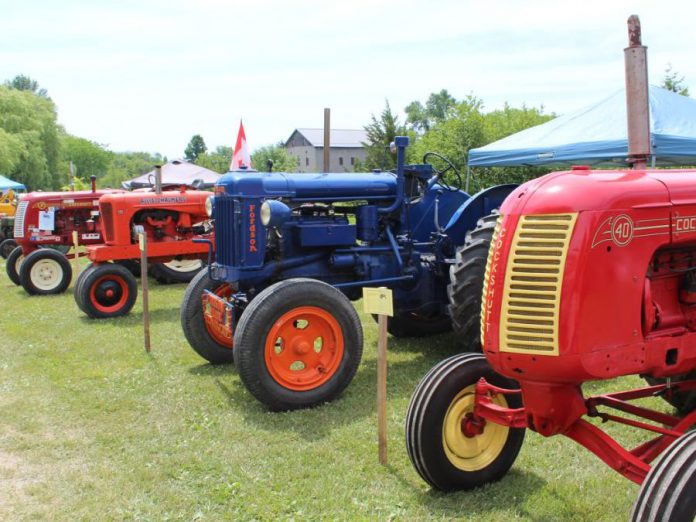 Antique tractors on display at the 2018 Father's Day Smoke & Steam Show.  (Photo courtesy of Lang Pioneer Village Museum / Facebook)