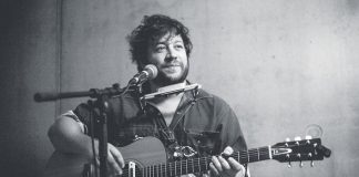 American alt-folk singer-songwriter This Frontier Needs Heroes (the stage name of Brad Lauretti) performs at The Garnet in downtown Peterborough on Wednesday, June 12th. (Photo: Silja Lomakka)
